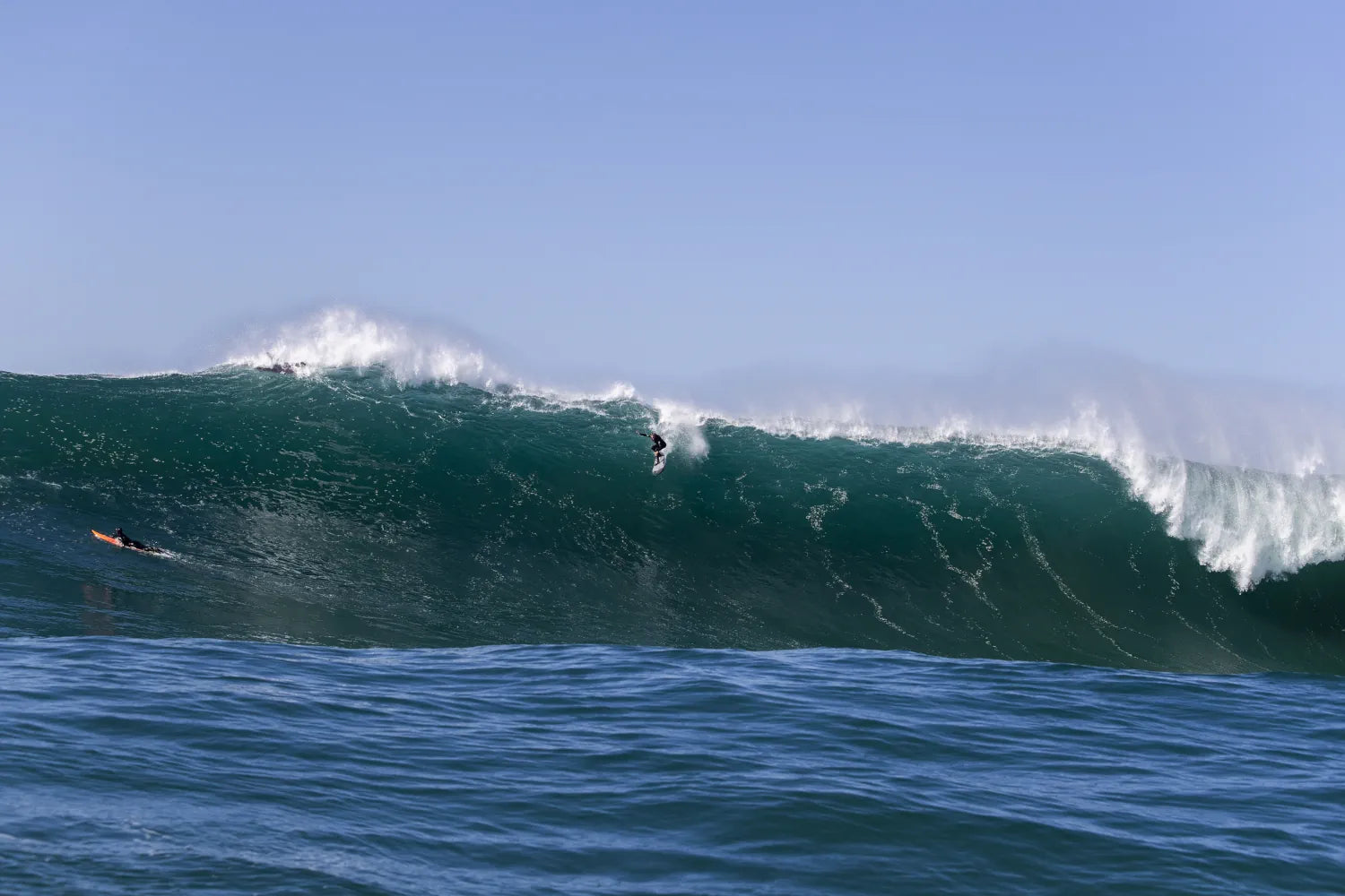 Grant Twiggy Baker drops into a giant Pacific swell at Mavericks, fine art ocean photography.